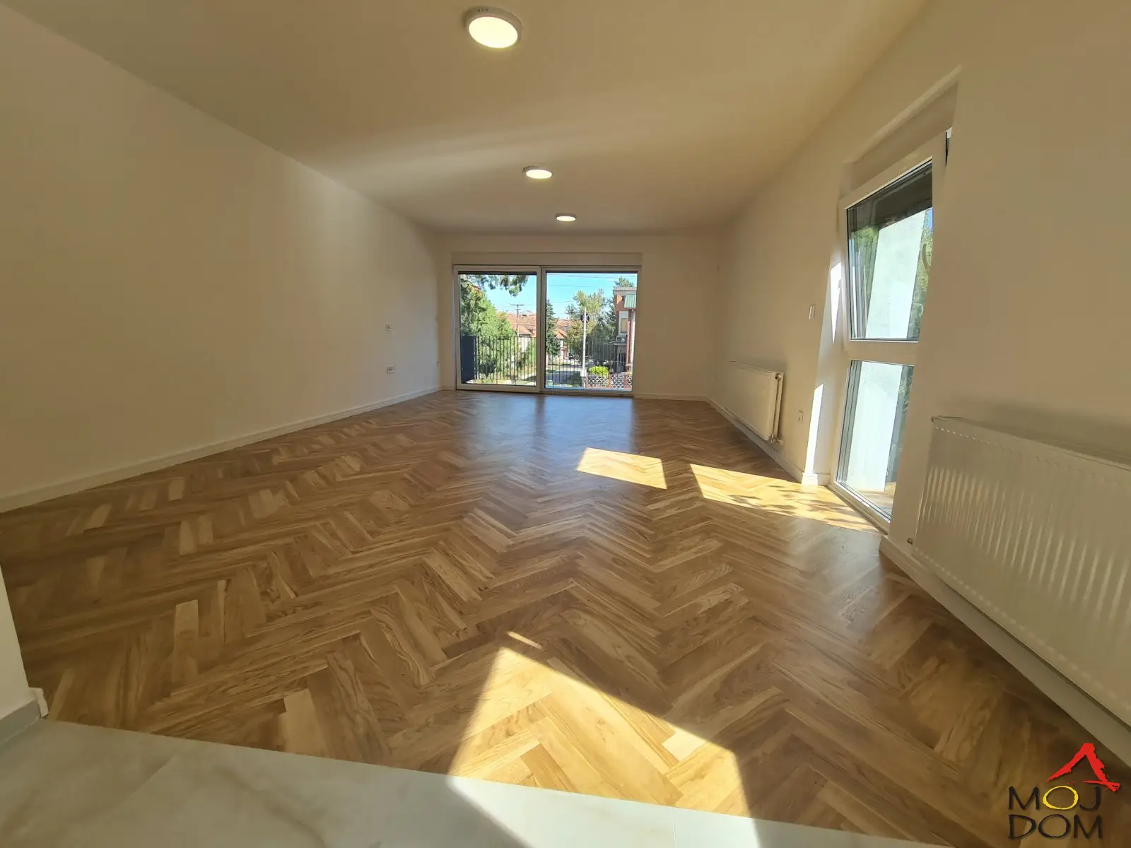 In Telep, one of the most desirable areas of Novi Sad, a completely new, modern four-room apartment is for sale. The apartment will be registered at 96m2, while with the terrace it has a total of 101m2. The spacious living room is designed as the heart of the home