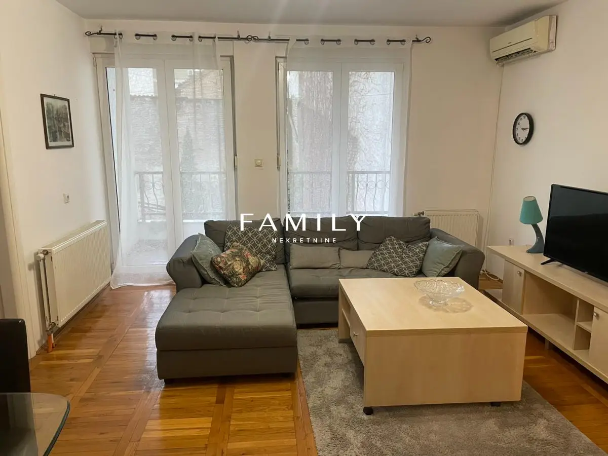 Furnished two-room apartment with spacious terrace in an ideal city center location – 51 m²