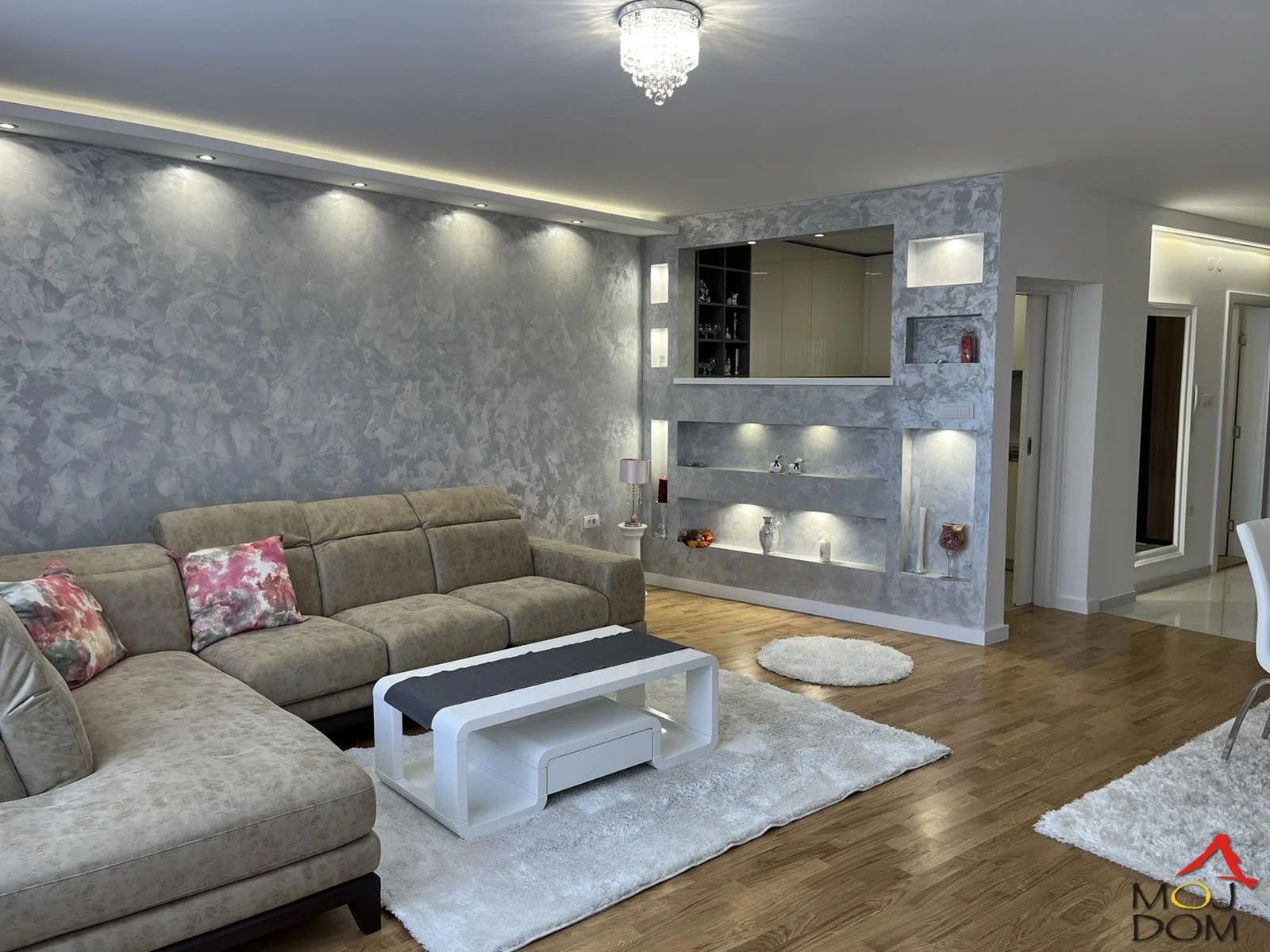 A new, luxuriously equipped four-room apartment with a total area of 101 m² is for sale, mostly furnished. The apartment is in a quality building set apart from city noise, but still close to all necessary amenities, making life easier for future residents.