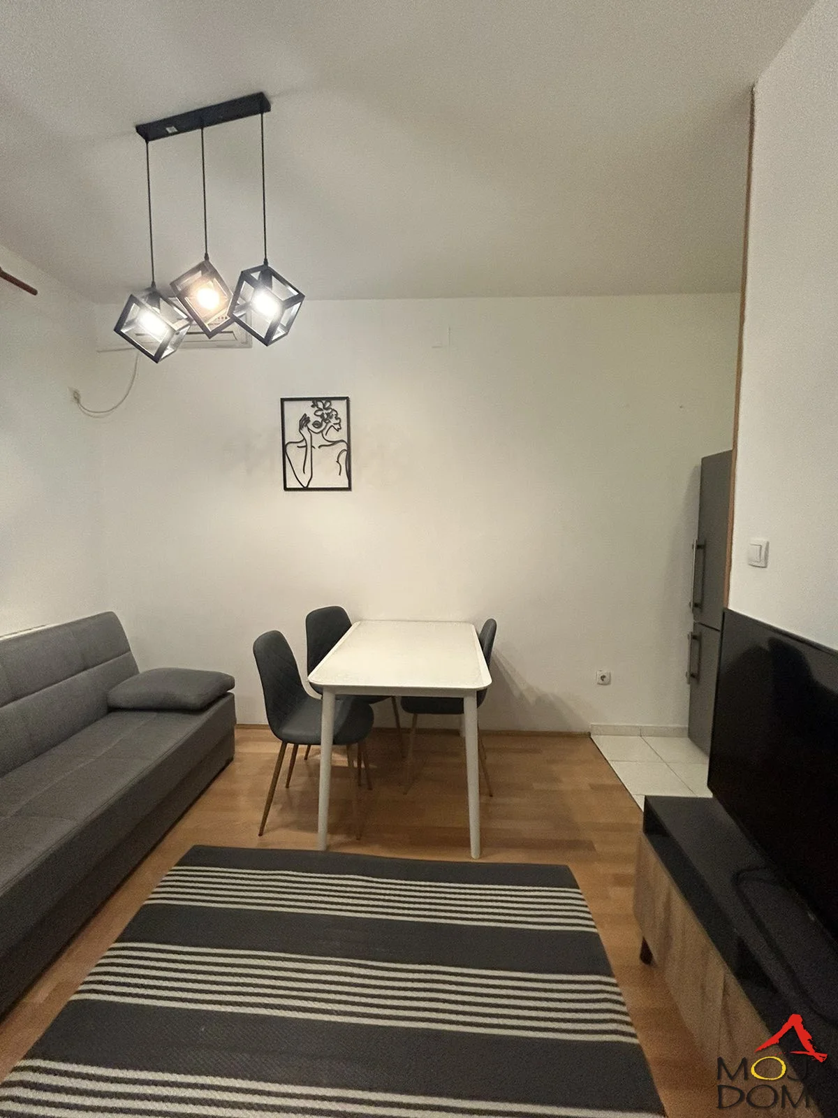 In the very center of Novi Sad, at one of the most desirable locations in the city, in a high-quality building and right next to the pedestrian zone and various cultural landmarks, is this extremely pleasant and functional duplex.

The lower level contains