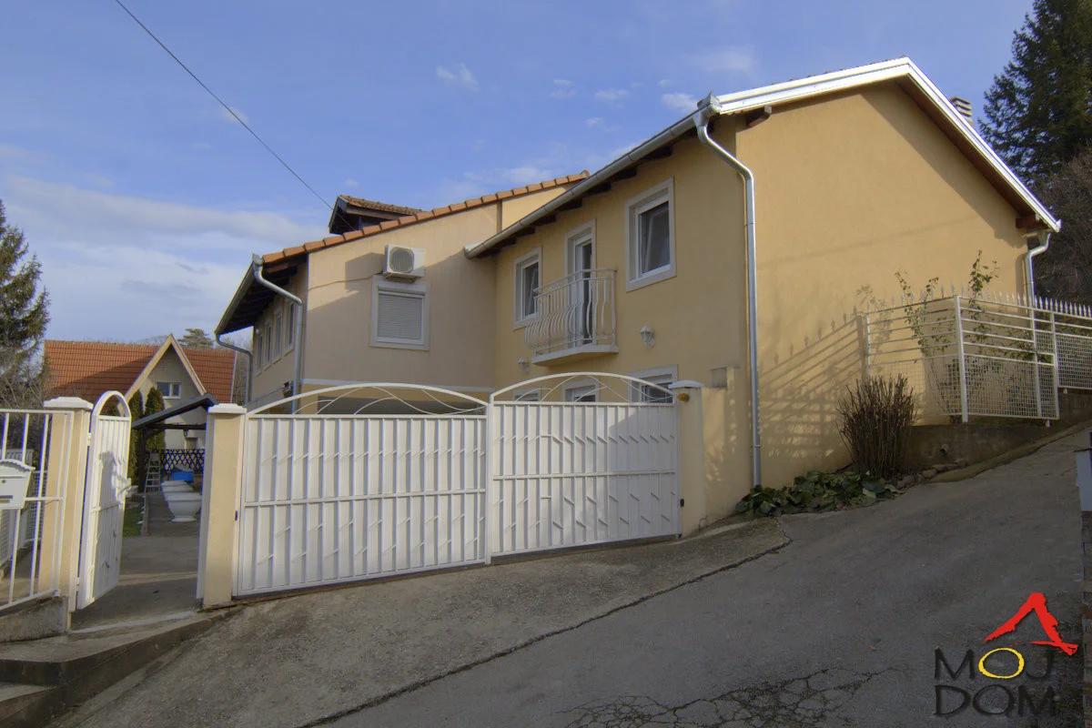 Large family house in a fantastic location, ideally connected to Novi Sad. The house is very spacious, consists of 5 bedrooms plus a living room, two bathrooms, and a beautiful terrace with an amazing view of the Danube. Among the extra buildings you get