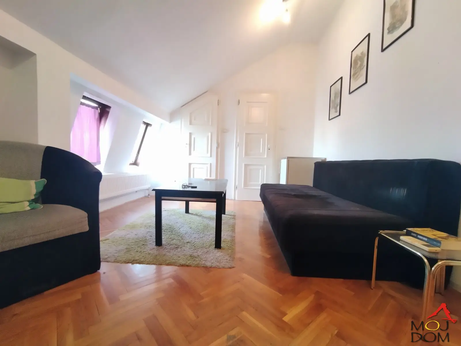 For sale: Functional studio apartment with a separated sleeping area, located at a prime location in the very center of Novi Sad – only 5 minutes walking distance from the pedestrian zone.

The apartment is in the attic of a well-maintained building at p